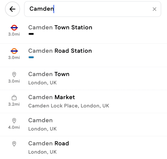 Search results for "Camden": Camden Town Station with the Underground roundel and a Northern line swatch, Camden Road Station with the Overground roundel and its line colour, then plain place results.
