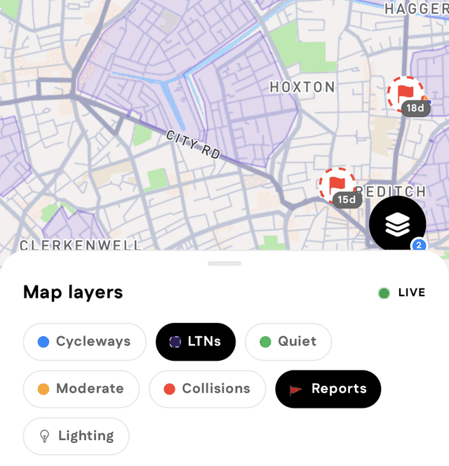 The Cyclemate map with low-traffic neighbourhoods shaded and rider report pins showing, above the Map layers sheet and its row of layer toggles.
